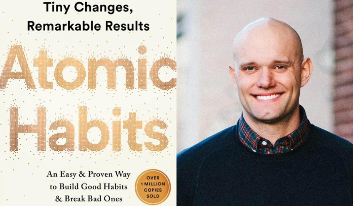 James Clear smiling with his book Atomic Habits