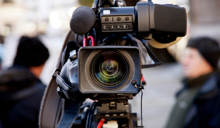 News video camera pointed at screen.