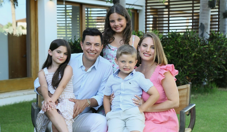 Tom Llamas, his wife, and their three children.