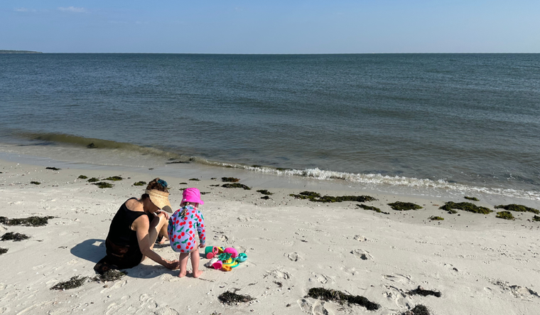 Maria and her granddaughter at the beach.