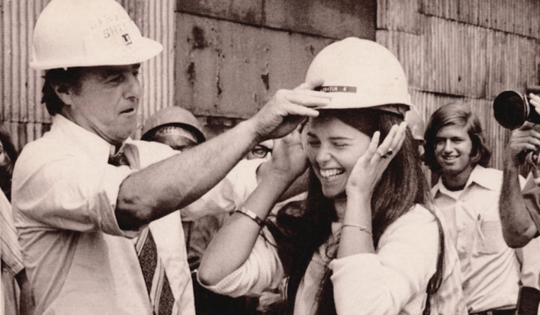 Maria wearing a hard hat.